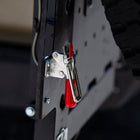 Close-up view of the adjustable-tension latch for the C4 dual swing rear bumper that helps tie the top of both swinging assemblies together. 