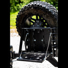 Close-up view of the fold-down table integrated into the tire-side swing of the C4 fabricated rear bumper for the Toyota 4Runner.