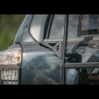 Close-up of the accessory ladder step bolted to the outside of the C4 hatch ladder, providing an additional contact point and allowing for the mounting of other accessories over the top of other steps.