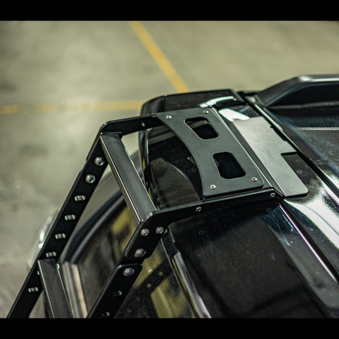Top view of the Summit hatch ladder showing the rubber tread inserts on the ladder steps as well as the top landing pad step. 