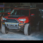 Driver's side quartering on angle showing the C4 Hybrid winch bumper for the 2014+ Toyota 4Runner.
