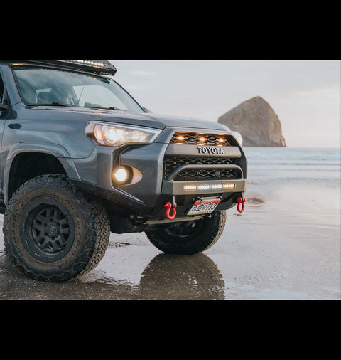 Grey 4Runner on the beach at the ocean, showing off a C4 Lo-Pro bumper with High Clearance Additions. 