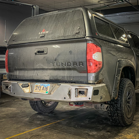 Second angle of the C4 Overland rear bumper for Toyota Tundras in bare steel finish before paint or powder coat. 