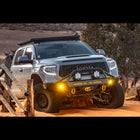 Grey Tundra driving in deep sand with a C4 Overland bumper installed.