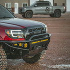 Steel winch bumper with tube sides from C4 Fabrication for the 2nd Gen Tacoma.
