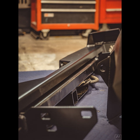 View of the inside of the rear Overland bumper showing the square tube hidden under the plate body that provides the base framework for the bumper.
