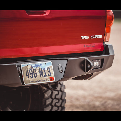 Close up view of the tow point and auxiliary lighting of the C4 Overland rear bumper.