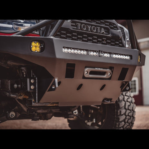 Close up of the front surfaces of the C4 Overland bumper with hawse fairlead installed as well as auxiliary LED lighting.