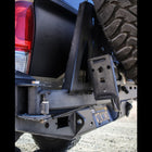 Close-up view of the hinge on the C4 rear bumper spare tire swing-out. 