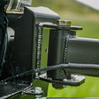 Close-up view of the rebuildable hinge on the C4 swing out bumper.