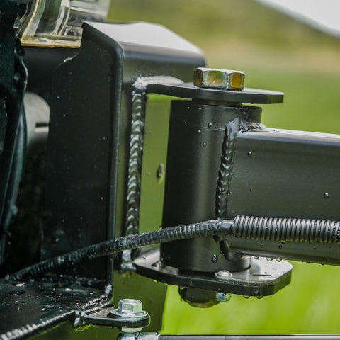 Close-up view of the rebuildable hinge on the C4 swing out bumper.