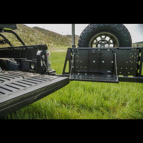 Wider view showing the fold-down table on the C4 swing-out bumper and how it corresponds to the height of the tailgate when folded down.