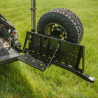 High-angle view showing the C4 swing-out deployed with the accessory table down and tailgate open.