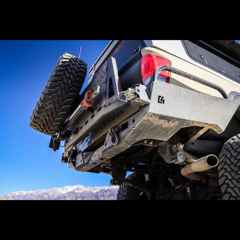 Low-angle view showing the structure and armor of the C4 High Clearance Rear Bumper for the Tacoma.