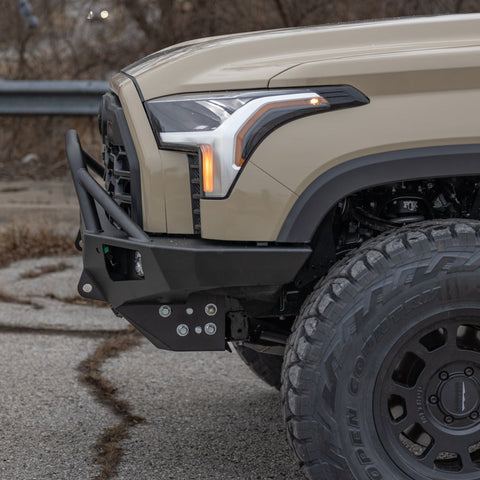 Close-up shot from the side of the C4 Overland bumper for the Toyota Tundra showing its tight conformation to the front of the grille.