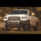 Front-on photo of the C4 Hybrid bumper with high bull bar and tube gussets for the early 2nd Gen Tundra.