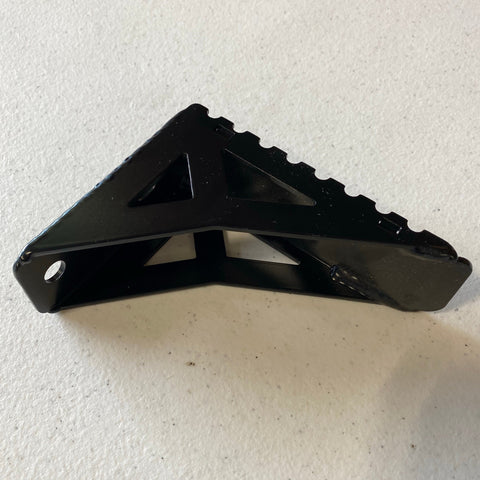 Close up image of the accessory side step for the C4 Summit hatch ladder showing its double-gusseted construction and serrated top step pad. 