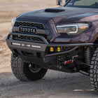 Purple 3rd Generation Tacoma with a C4 Hybrid front winch bumper with low bull bar. 