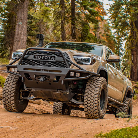 Low angle showing the C4 Hybrid front bumper on a 3rd Gen 4-door Tacoma.