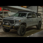 Grey tundra with C4 Overland bumper.