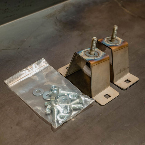 Photo showing the two steel brackets and mounting hardware included with the C4 Horizontal Hi-Lift Bracket kit.