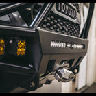 Single row light bar mounted inside a C4 Hybrid front winch bumper.