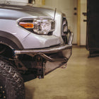 Side view of the C4 Hybrid bumper with mid-height bull bar showing how tight the bull bar fits to the grille.