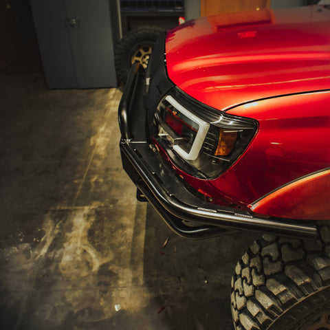 Top-down view of the C4 Hybrid front bumper for 2005-2011 Tacomas showing the plate reinforcement on the tube sides and the mid-height bull bar. 